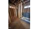 Unfinished bathroom with visible framing, plumbing, and shower base ready for fixtures installation at 432 Golden Dragonfly St, Wake Forest, NC 27587