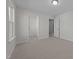 Bright bedroom featuring neutral carpet, closet and natural light at 432 Golden Dragonfly St, Wake Forest, NC 27587
