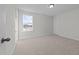 Bright bedroom with a window view of a neighborhood under construction at 432 Golden Dragonfly St, Wake Forest, NC 27587
