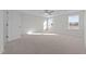 Spacious bedroom features neutral carpet, ample lighting, and a ceiling fan at 432 Golden Dragonfly St, Wake Forest, NC 27587