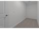 This carpeted closet has a single light switch at 432 Golden Dragonfly St, Wake Forest, NC 27587