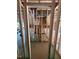 Unfinished staircase, viewed through wooden frame, is visible, along with the house's internal framing at 432 Golden Dragonfly St, Wake Forest, NC 27587