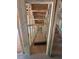 Unfinished stairway area showcasing the framing and construction process at 432 Golden Dragonfly St, Wake Forest, NC 27587