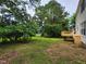 Expansive backyard with a new deck, ideal for outdoor activities and enjoying nature at 4903 Bridgewood Dr, Durham, NC 27713