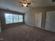 Spacious bedroom with large window, vaulted ceiling, ceiling fan, and closet at 4903 Bridgewood Dr, Durham, NC 27713