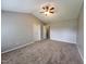Large bedroom with vaulted ceiling, ceiling fan, and double closets at 4903 Bridgewood Dr, Durham, NC 27713