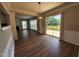 Dining room with a view to the backyard and an open floor plan at 4903 Bridgewood Dr, Durham, NC 27713
