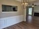 Dining room with decorative molding and a view into the living room at 4903 Bridgewood Dr, Durham, NC 27713