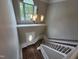 A chandelier highlights the foyer and staircase at 4903 Bridgewood Dr, Durham, NC 27713