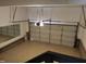 Spacious garage featuring a durable floor coating and ample room for vehicles and storage at 4903 Bridgewood Dr, Durham, NC 27713