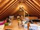 Unfinished attic space that can be used for storage at 5009 Beckwyck Dr, Fuquay Varina, NC 27526