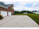 Expansive backyard features a basketball court and a well-manicured lawn, perfect for outdoor activities at 5009 Beckwyck Dr, Fuquay Varina, NC 27526