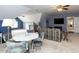 Large bonus room featuring a seating area, a dining table, and a television at 5009 Beckwyck Dr, Fuquay Varina, NC 27526