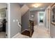 Upstairs hallway showcasing a staircase and views to other bedrooms at 5009 Beckwyck Dr, Fuquay Varina, NC 27526