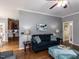 Cozy living room with hardwood floors and plenty of seating at 5009 Beckwyck Dr, Fuquay Varina, NC 27526