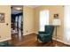 Cozy living room with hardwood floors and large windows at 5009 Beckwyck Dr, Fuquay Varina, NC 27526