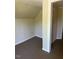 Small attic storage space with neutral walls and flooring at 509 W Rose St, Sanford, NC 27330