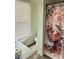 This bathroom features a decorative shower curtain and a vanity sink at 509 W Rose St, Sanford, NC 27330