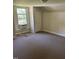 Bedroom features neutral carpet, natural light, and is ready to be customized at 509 W Rose St, Sanford, NC 27330
