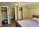 This bedroom offers a queen-sized bed and two closets for storage at 509 W Rose St, Sanford, NC 27330