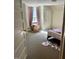 This bedroom offers a window with natural light and comfortable carpet at 509 W Rose St, Sanford, NC 27330