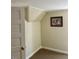 This bedroom features tan walls and carpet with an attic design at 509 W Rose St, Sanford, NC 27330