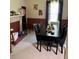 Formal dining area with black furniture at 509 W Rose St, Sanford, NC 27330