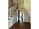 Inviting entryway with hardwood floors and staircase leading to the upper level at 509 W Rose St, Sanford, NC 27330