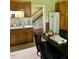 Eat in kitchen with adjacent stairway in the house at 509 W Rose St, Sanford, NC 27330