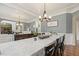 Spacious dining room features hardwood floors, decorative lighting, and elegant decor at 5516 Colonial Oaks Dr, Apex, NC 27539