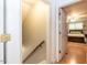 View into a bedroom with hardwood floors, ceiling fan, and neutral paint colors at 589 John Mitchell Rd, Youngsville, NC 27596