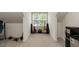 Bonus room area featuring guitars and guitar amp by the window at 589 John Mitchell Rd, Youngsville, NC 27596