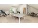 Large bonus room with ping pong table and seating area at 589 John Mitchell Rd, Youngsville, NC 27596