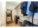 Walk-in closet with rods and shelving at 589 John Mitchell Rd, Youngsville, NC 27596