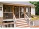 Stairs from deck to the screened porch at 589 John Mitchell Rd, Youngsville, NC 27596