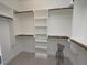 Spacious walk-in closet with custom shelving and hanging rods at 595 E Cabarrus St, Raleigh, NC 27601