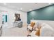 Cozy bonus room with accent wall, offering a versatile space for work or relaxation at 611 Callan View Ave, Wake Forest, NC 27587