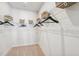 Walk-in closet with shelving and clothing hangers at 611 Callan View Ave, Wake Forest, NC 27587