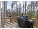 View of back deck overlooking wooded area at 629 Newlyn Dr, Raleigh, NC 27606