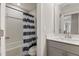 Neutral bathroom with a shower, tub combo, toilet, vanity with a sink, and good lighting at 629 Newlyn Dr, Raleigh, NC 27606
