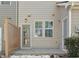 Private back patio with a privacy fence, perfect for relaxing or entertaining outdoors at 684 Wickham Ridge Rd, Apex, NC 27539