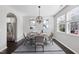 Bright dining area with stainless steel appliances and stylish décor for a contemporary living space at 684 Wickham Ridge Rd, Apex, NC 27539