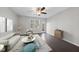 Inviting living room with hardwood floors, cozy seating, and natural light, perfect for relaxation and gatherings at 684 Wickham Ridge Rd, Apex, NC 27539