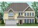 Charming two-story home featuring a welcoming porch and a two-car garage, nestled among lush trees at 74 Black Walnut Dr # 199, Garner, NC 27529