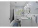 Bathroom with a shower-tub combo, a vanity, and a tiled floor at 808 Ravenwood Dr, Raleigh, NC 27606