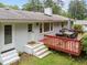 Backyard featuring a deck with outdoor furniture and a grill at 808 Ravenwood Dr, Raleigh, NC 27606