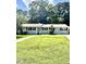 Charming one-story home with a beautiful lawn, walkway, and lovely curb appeal at 808 Ravenwood Dr, Raleigh, NC 27606