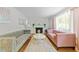 Bright living room with decorative fireplace and stylish modern furniture at 808 Ravenwood Dr, Raleigh, NC 27606