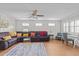 Inviting living room with a sectional sofa and lots of natural light and decor at 808 Ravenwood Dr, Raleigh, NC 27606