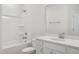 Bright bathroom featuring a shower-tub combo with white tiling and a single sink vanity at 809 Hyperion Aly, Wake Forest, NC 27587